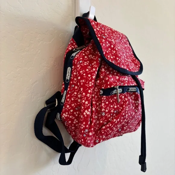 LeSportsac Small Edie Backpack in red  with a white and blue floral pattern. - Picture 3 of 12